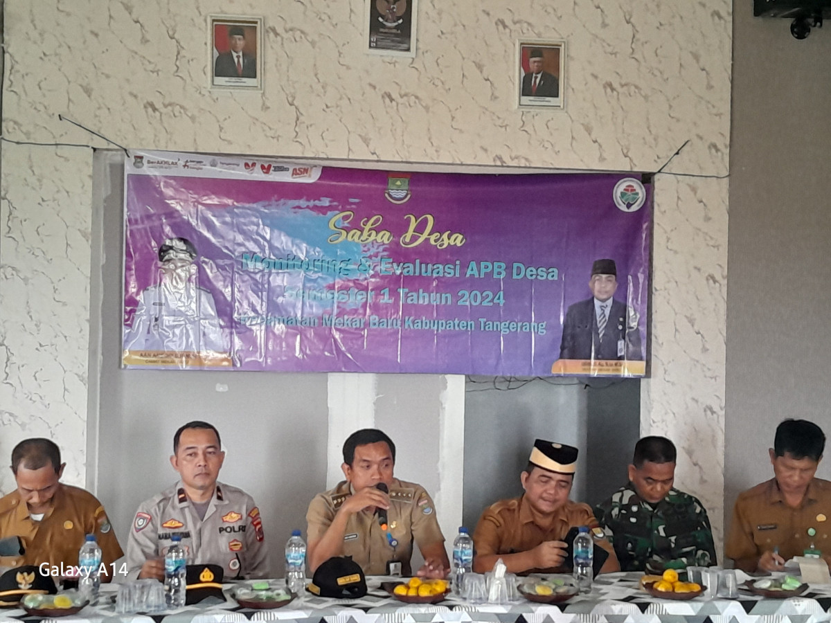 Camat Mekar Baru Hadiri Saba Desa Monitoring dan Evaluasi APBDes Semester 1 Tahun 2024